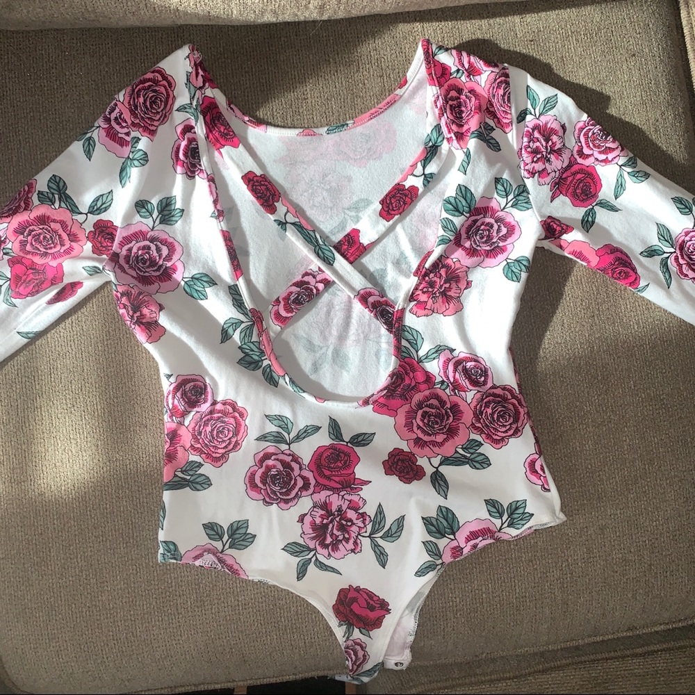 Garage criss cross open back long sleeve body suit